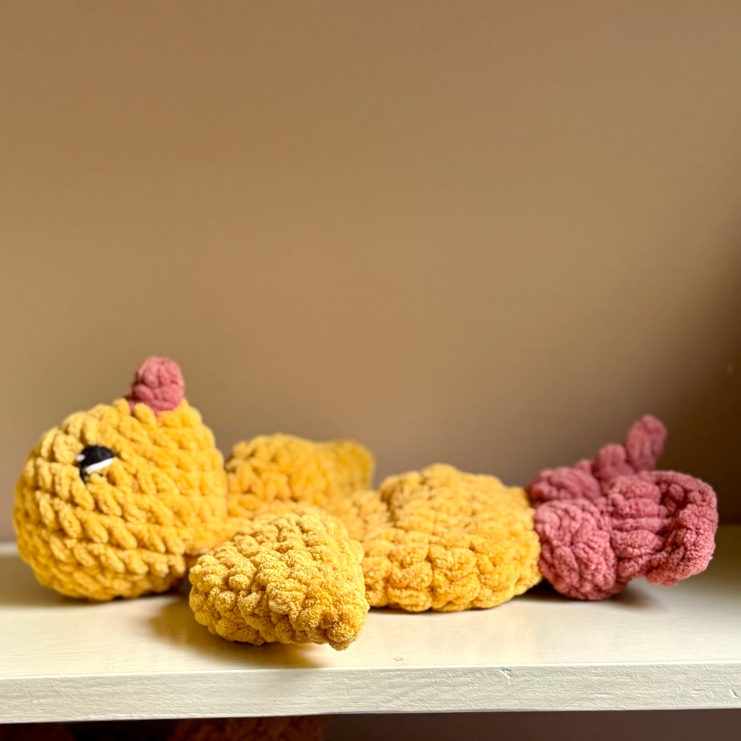 Chickie the Chick Snuggler (yarn eyes)