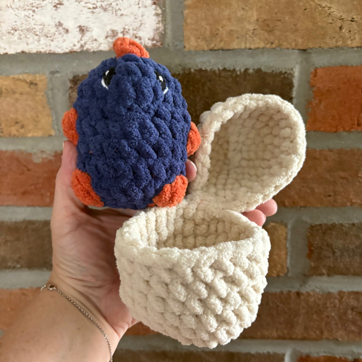 Hatching Dino (yarn eye)